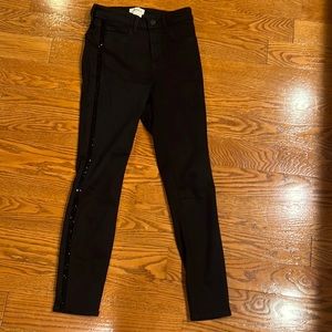 Black jeans with black sparkle up and down sides of legs